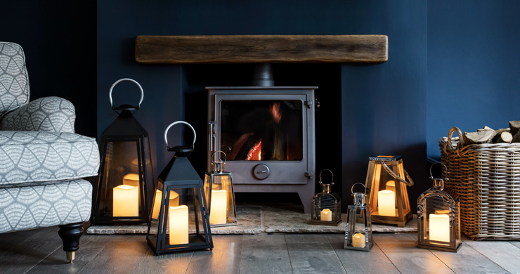 cosy navy living room with lanterns