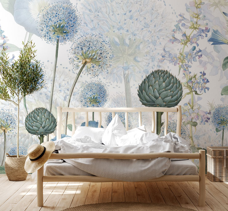 blue and green illustrated botanical wallpaper in boho bedroom