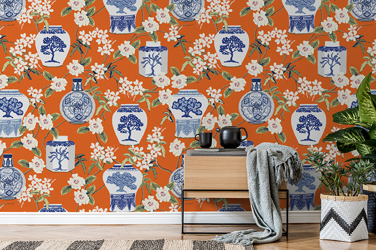 blue and white oriental pots on orange background wallpaper in trendy lounge