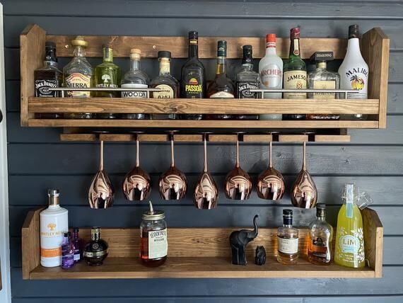 summer house bar shelves on navy painted wall