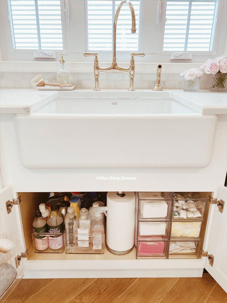 white sink with compartment storage underneath
