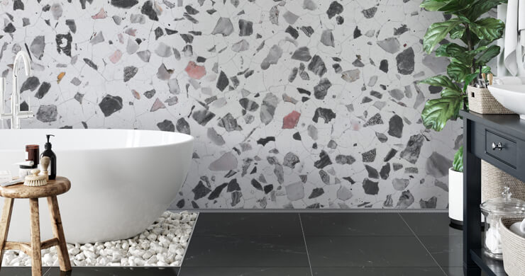 Modern bathroom trendfor 2023 with a grey and white terrazzo wallpaper