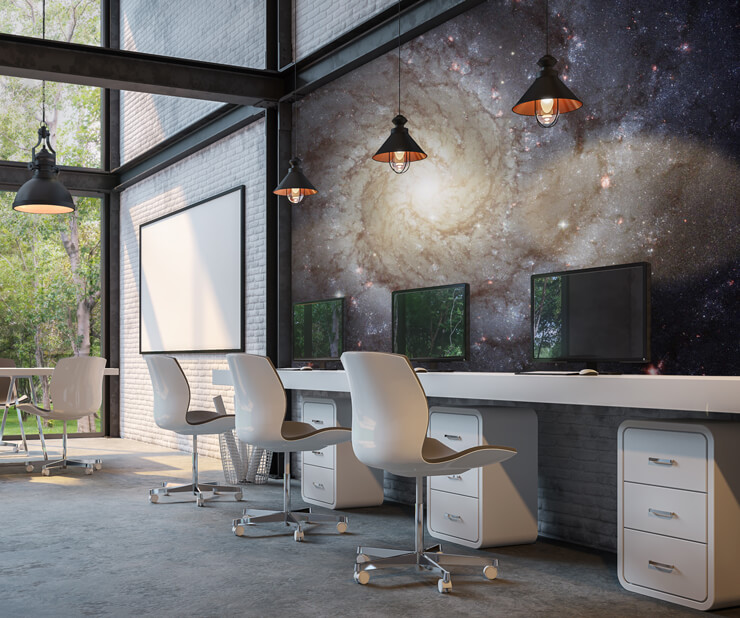 Spiral Galaxy wallpaper in an office with white tables and chairs
