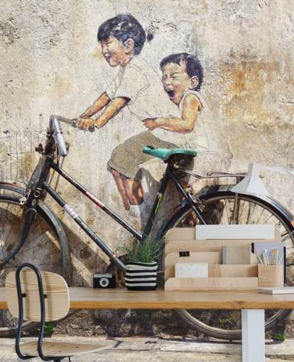 banksy style wallpaper mural called Little Children on a Bicycle for bedrooms, businesses and offices