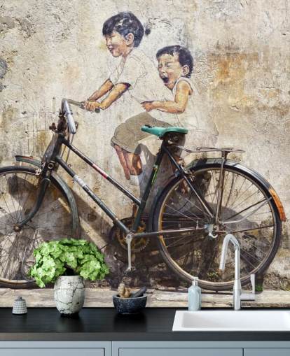 banksy style wallpaper mural called Little Children on a Bicycle for bedrooms, businesses and offices