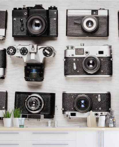 Black and White Collage of Vintage Cameras Wallpaper
