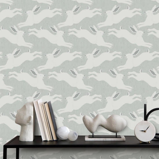 Hoppande harar Mist Blue Bakgrund