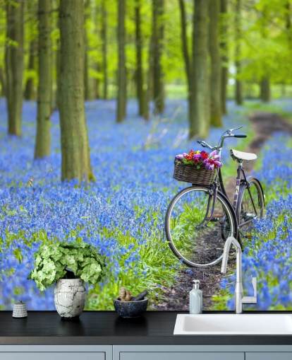 blauwe en groene bosmuurschildering met blauwe bellen genaamd Bicycle in Spring Forest door Assaf Frank
