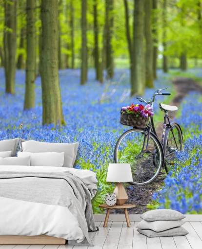 blauwe en groene bosmuurschildering met blauwe bellen genaamd Bicycle in Spring Forest door Assaf Frank