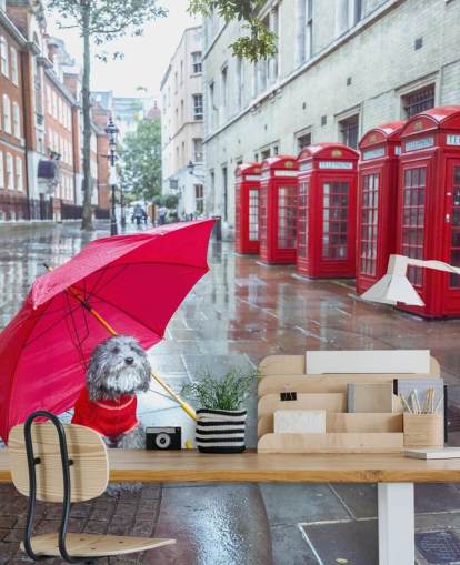 red and grey london street mural called London Dog with Umbrella by Assaf Frank red and grey london street mural called London Dog with Umbrella by Assaf Frank
