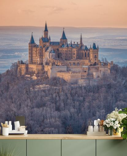 murale arancione e viola con paesaggio del castello chiamato Castello di Hohenzollern, Germania di Assaf Frank