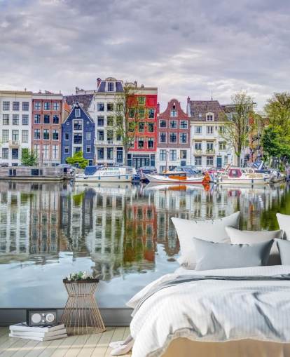 blue and white canal mural called Amsterdam Townhouses by Assaf Frank