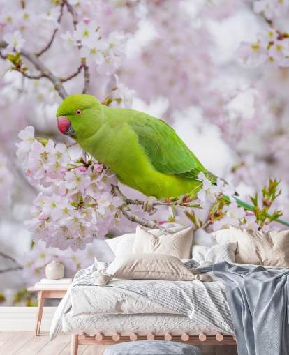 rosafarbenes und grünes Kirschblüten-Wandbild mit dem Titel Papagei Sitting in a Blossom Tree von Assaf Frank