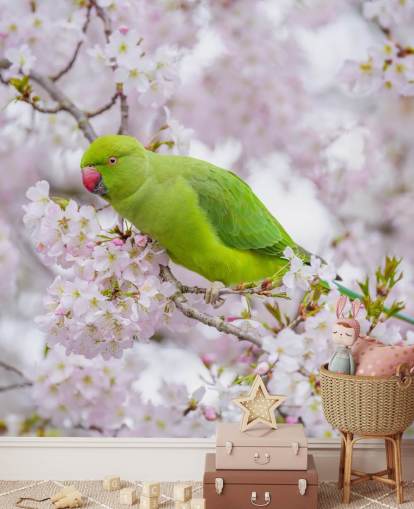 pink and green cherry blossom mural called Parrot Sitting in a Blossom Tree by Assaf Frank