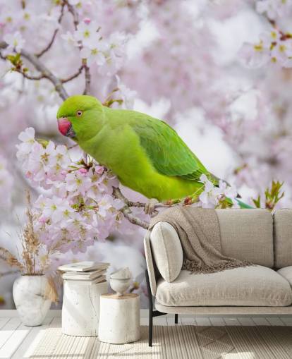 murale con fiori di ciliegio rosa e verde chiamato Parrot Sitting in a Blossom Tree di Assaf Frank