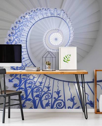 mural de pared con efecto 3D azul y blanco llamado escalera en espiral de Assaf Frank