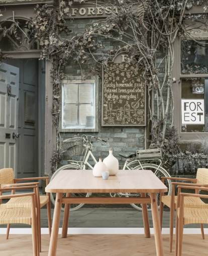 Harmaa myymälän julkisivun seinämaalaus nimeltä Bicycle Outside a Cafe, York, kirjoittanut Assaf Frank