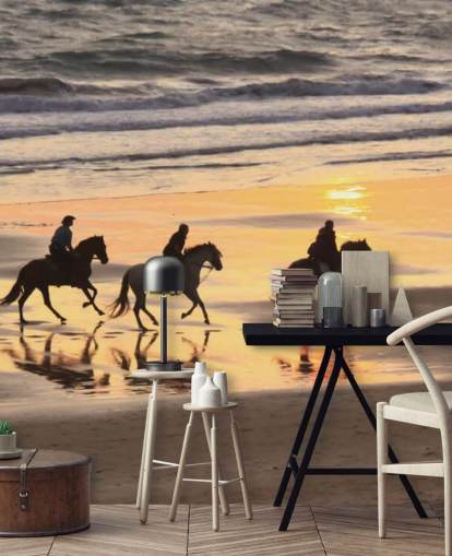 Fondo de pantalla de caballos corriendo en una playa al atardecer