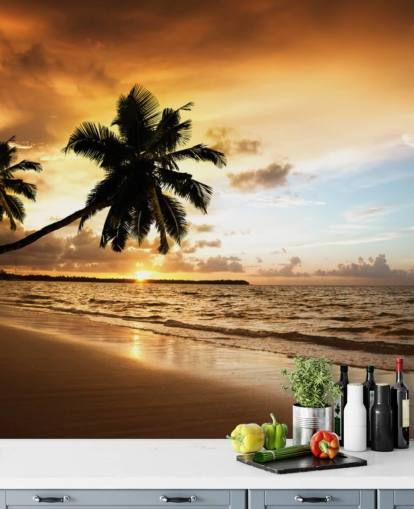 Mural de pared Atardecer en una playa tropical