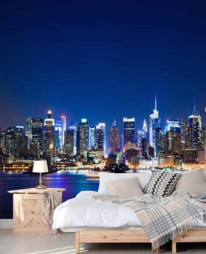 mural azul de papel pintado de paisaje urbano de Nueva York llamado Manhattan Night Skyline para dormitorios y oficinas