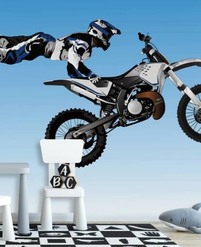 Motociclista de motocross voando na parte de trás da bicicleta Motociclista de motocross voando na parte de trás da bicicleta