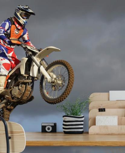 Motorcross Biker i Air Bakgrunn