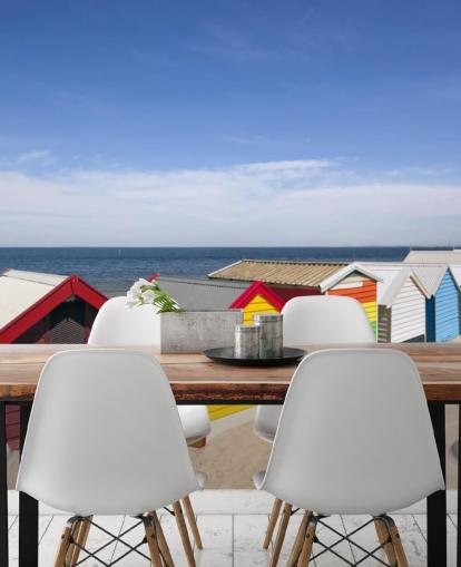 colourful beach huts on beach wallpaper