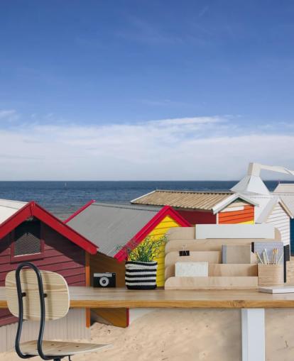 colourful beach huts on beach wallpaper