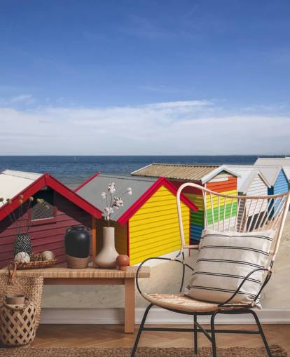 colourful beach huts on beach wallpaper
