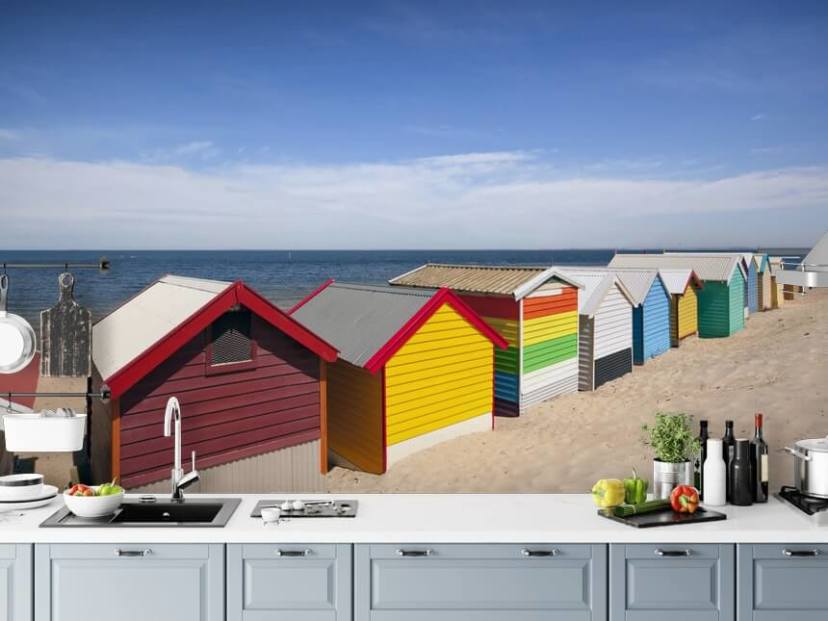 colourful beach huts on beach wallpaper