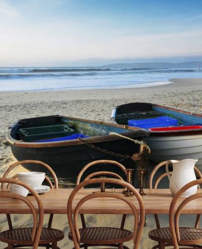 Twee boten op de muurschildering van het strand