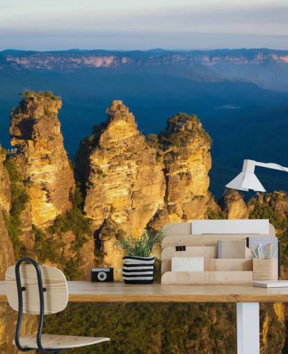 three mountain peeks on a mountain wallpaper