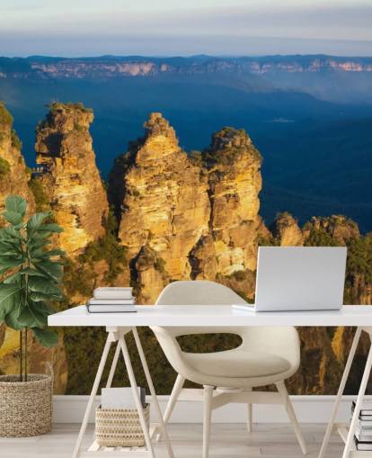 fondo de pantalla de tres montañas en una montaña