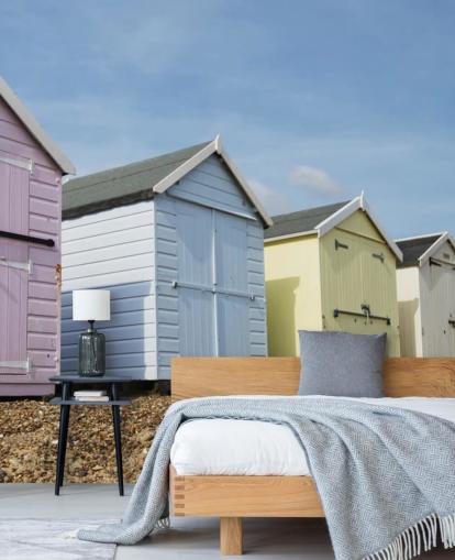 Pastelkleurige strandhutten behang