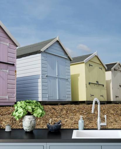 Pastelkleurige strandhutten behang