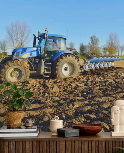 Blå traktor plöjning väggmålning