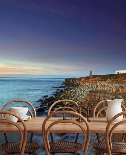 Red and White Lighthouse on Cliff by the Sea Wall Mural