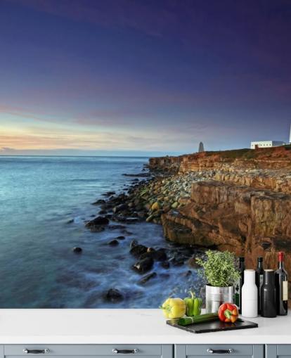 Red and White Lighthouse on Cliff by the Sea Wall Mural
