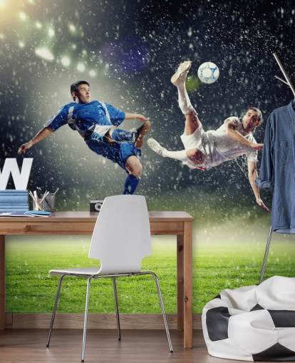 mural de papel de parede de futebol personalizável em azul, verde e branco chamado Two Football Players Striking the Ball para quarto infantil