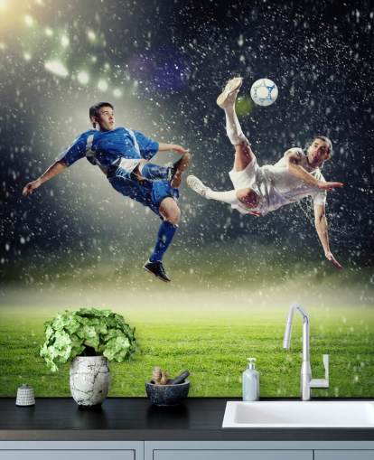 mural de papel de parede de futebol personalizável em azul, verde e branco chamado Two Football Players Striking the Ball para quarto infantil