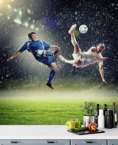 mural de papel de parede de futebol personalizável em azul, verde e branco chamado Two Football Players Striking the Ball para quarto infantil