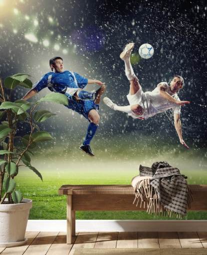 blauwe, groene en witte aanpasbare voetbalbehangmuurschildering genaamd Two Football Players Striking the Ball voor de kinderkamer