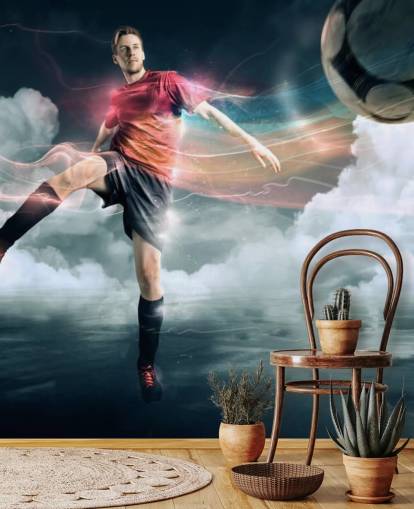 Voetballer Kicking Ball Wallpaper