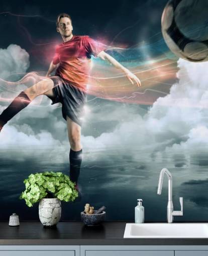 Football Player Kicking Ball Wallpaper