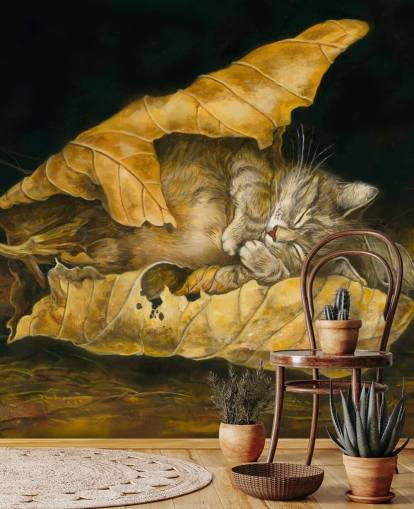 chaton endormi dans les feuilles d'automne chaton endormi dans les feuilles d'automne