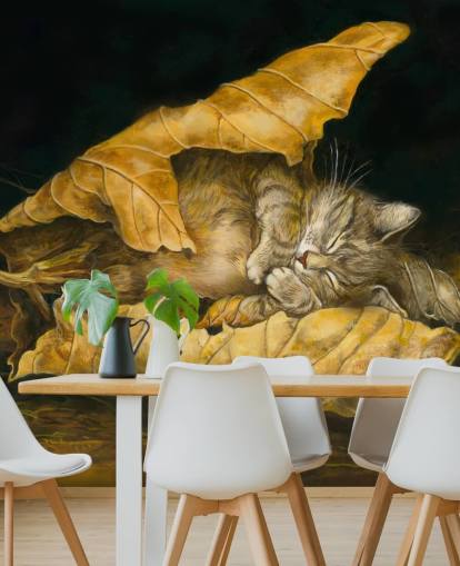 kissanpentu unessa syksyllä lehdet kissanpentu unessa syksyllä lehdet