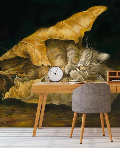 gatito dormido en hojas de otoño