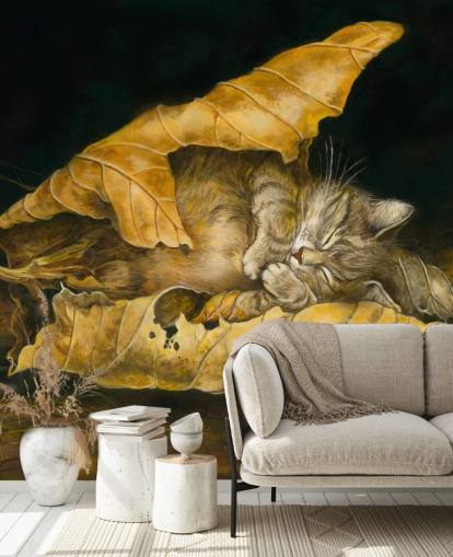 gatito dormido en hojas de otoño