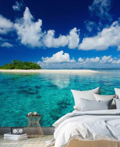 Blaues Wasser und kleine tropische Insel-Tapete