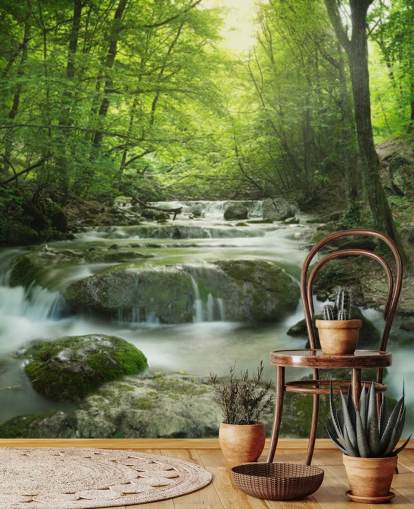 mural verde personalizable de papel pintado de bosque llamado Enchanting Forest Waterfall para hogares y oficinas.